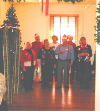 The Billy Hunt Singers caroled at the Museum last year and will again this year!